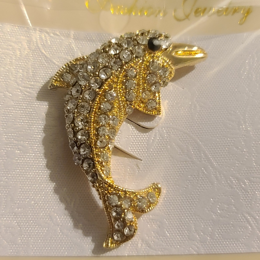 Gold-tone crystal dolphin broach lapel pin